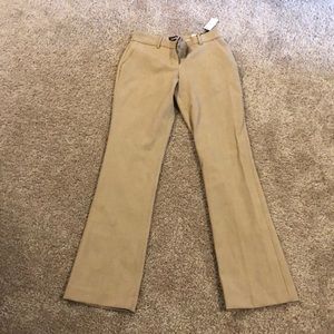 Tan dress pants.